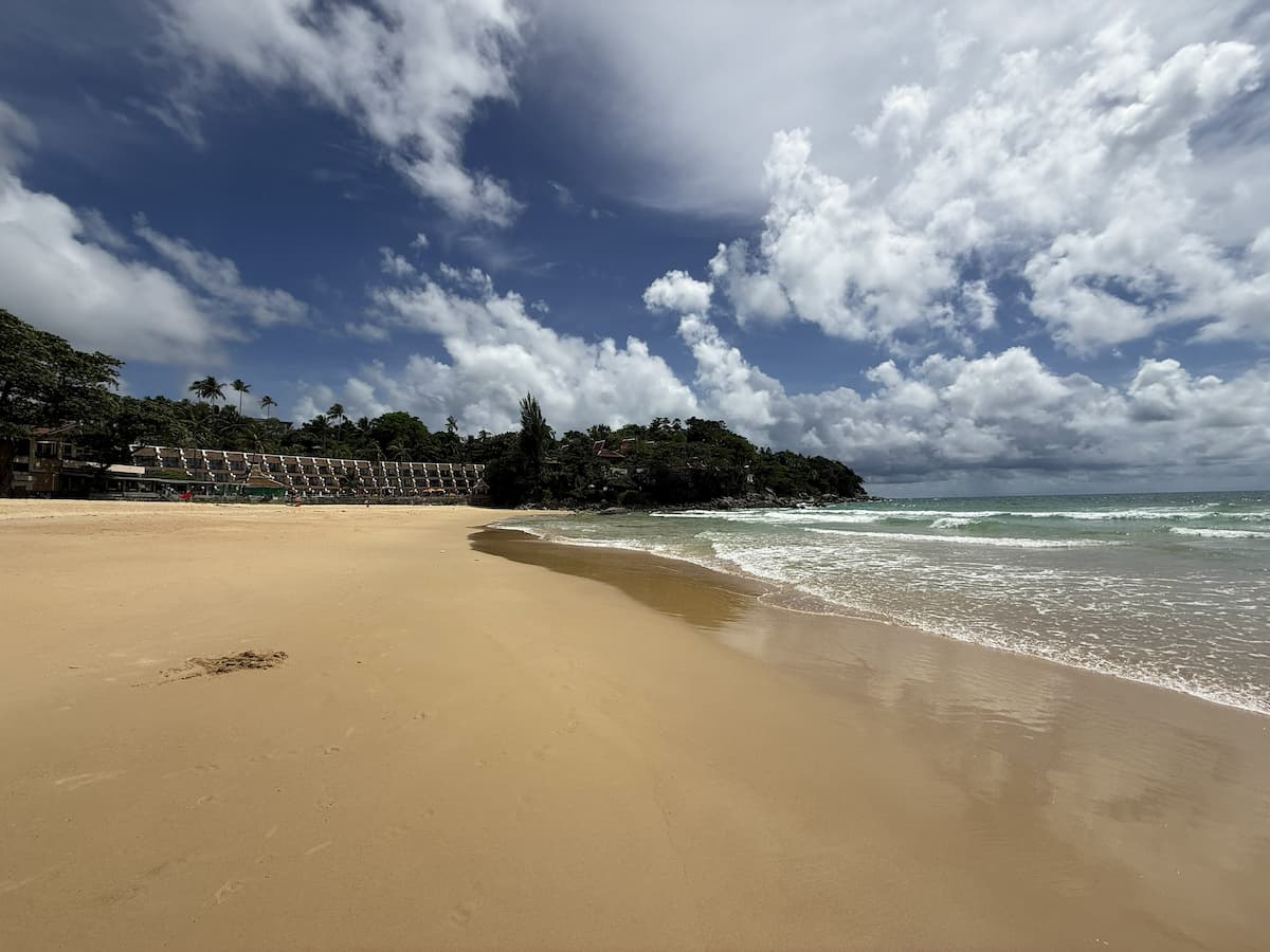Selecting images for an article using a Karon Beach photograph chosen for its relevance, context and sense of place.